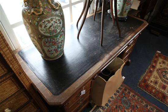 Attributed to Gillows. A Victorian gothic revival rosewood pedestal desk, W.4ft 8in. D.2ft 2in. H.2ft 5.5in.